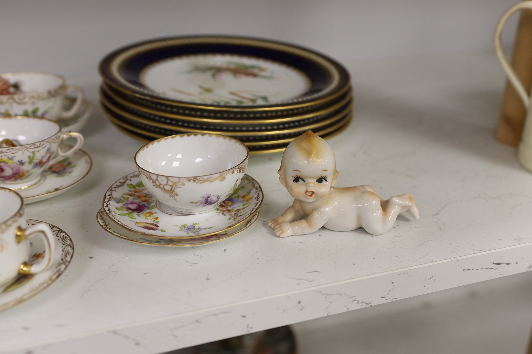 A group of Dresden floral cups and saucers, and five jewelled cabinet plates, etc.